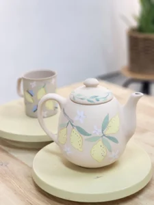Underglaze ceramic painting a lemon teapot