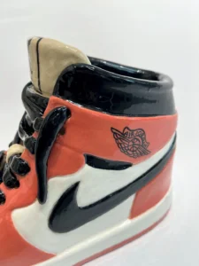 Nike air jordan ceramic sculpture in black and red