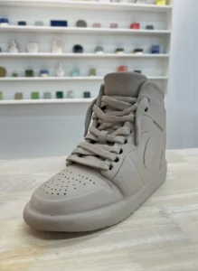 Ceramic sculpture ceramic nike air jordan in Black and red